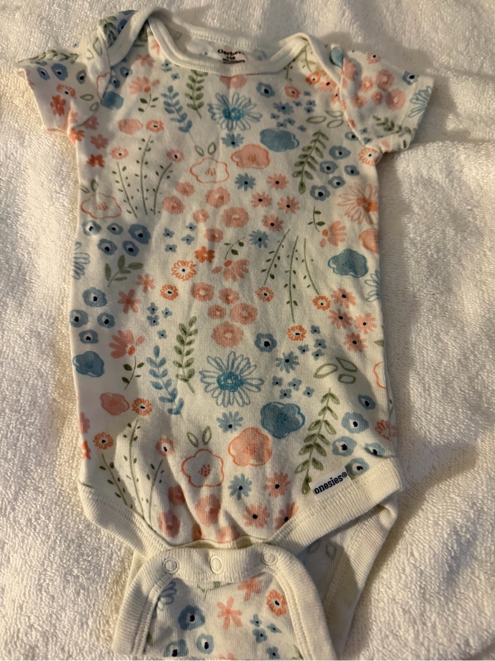 Gerber Floral Short-Sleeve Baby One-Piece in White with Blue & Pink Accents